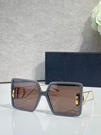 Sunglasses with dark blue square frames and brown tinted lenses