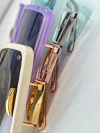 Purple and cream square sunglasses with gold-tone hinges and tinted lenses