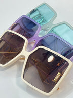 Lavender and mint square sunglasses with cream frame and tinted lenses
