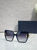 Dior square sunglasses with dark frame and smoky blue gradient lenses
