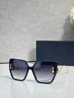 Dior square sunglasses with dark frame and smoky blue gradient lenses