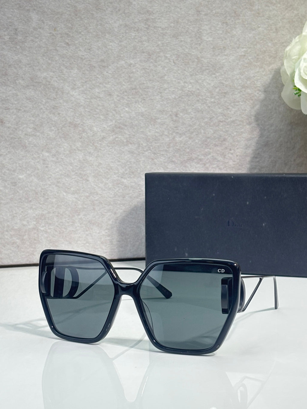 Dior square sunglasses with dark navy frame and dark blue lenses