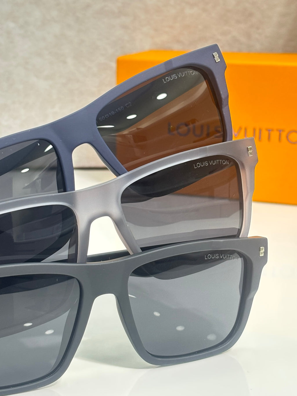 Louis Vuitton sunglasses set with navy and light gray square frames