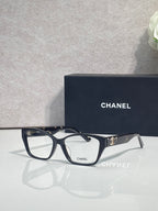 Chanel eyeglasses with dark rectangular frames and leopard-print side accents