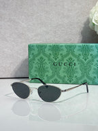 Gucci sunglasses with mixed silver and dark lenses