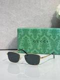 Gucci sunglasses, gold metal frame and dark square lenses, with black temples