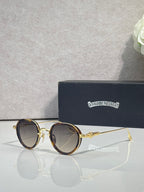 Chrome round glasses with gradient brown lenses and gold frame