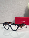 Black square eyeglasses with tortoiseshell arms and clear lenses, Prada branding on front