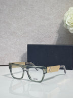 Dior eyeglasses with clear-olive square frames and gold textured temple detail