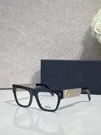 Dior eyeglasses with black square frames and gold textured temple detail