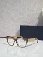 Dior eyeglasses with tortoiseshell square frames and gold textured temple detail
