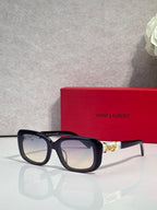 YSL rectangular sunglasses with dark tortoiseshell frames and tinted lenses