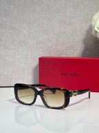 YSL rectangular sunglasses with dark tortoiseshell frames and pale tinted lenses