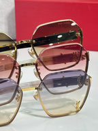 YSL glasses close-up: stacked tinted lenses with gold frame and logo accents