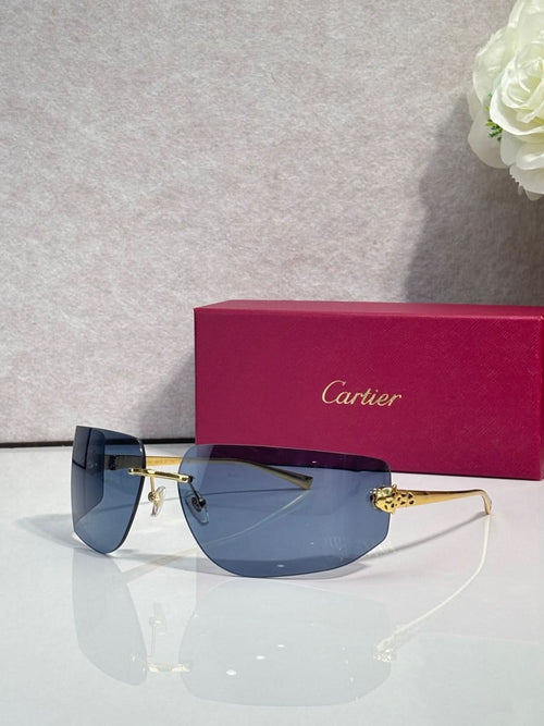 Cartier sunglasses with blue-tinted gradient lenses and gold-tone metal frame