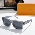 Louis Vuitton sunglasses with gray frame, dark lenses, logo-pattern temple detail.