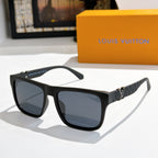 Louis Vuitton sunglasses with black frame, dark lenses, and dark textured patterned arms