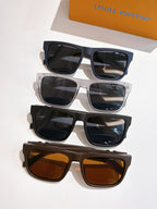 Louis Vuitton sunglasses set with black, gray, and brown frames, tinted lenses