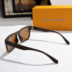 Louis Vuitton sunglasses side view with dark frame and amber lenses, textured patterned arms