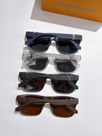 Louis Vuitton sunglasses set with black, silver, and brown frames, tinted lenses
