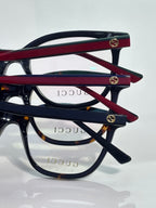 Eyeglasses frames in black with burgundy bars, clear lenses, stacked side view
