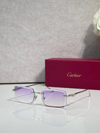 Cartier eyeglasses with gold frame and purple-tinted square lenses