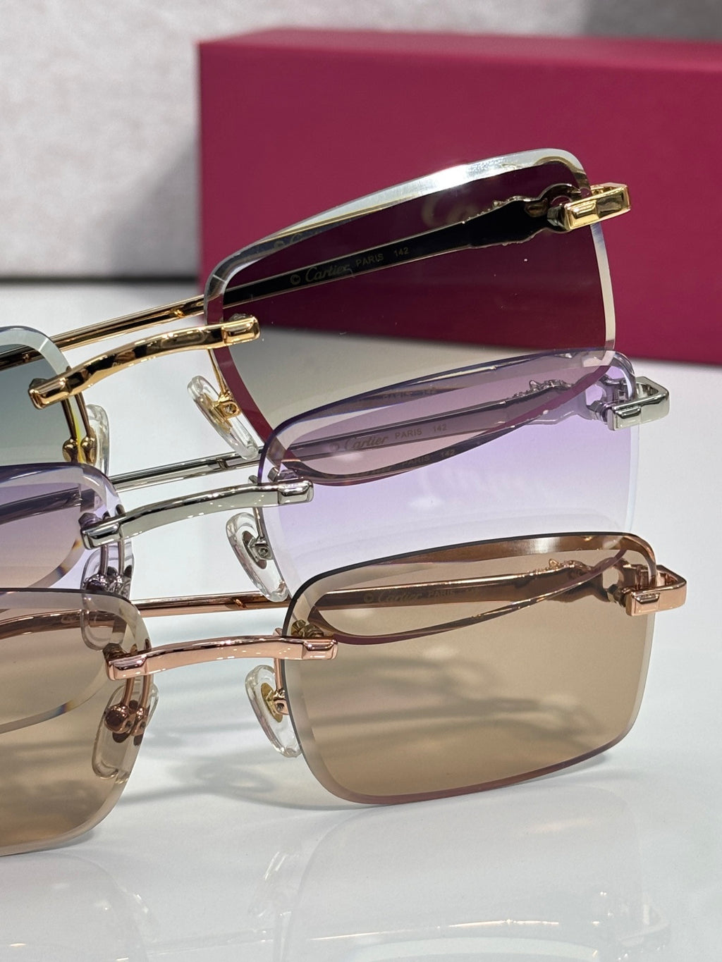 Cartier eyeglasses side view with stacked gold frames and tinted lenses