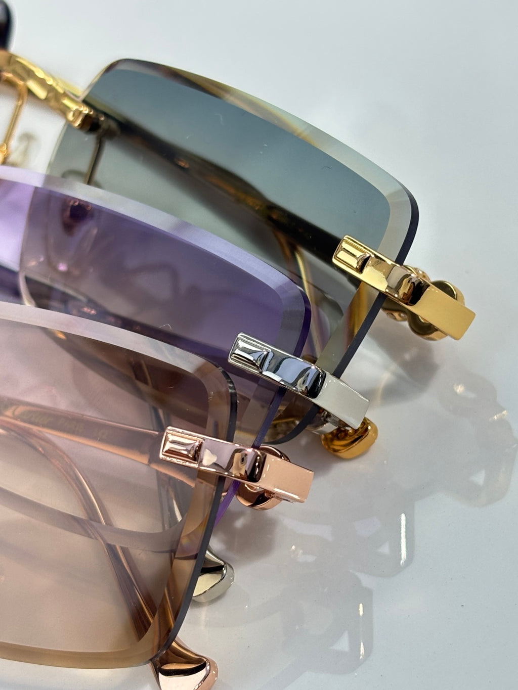 Cartier glasses close-up of hinge and gold bridge with clear lens area