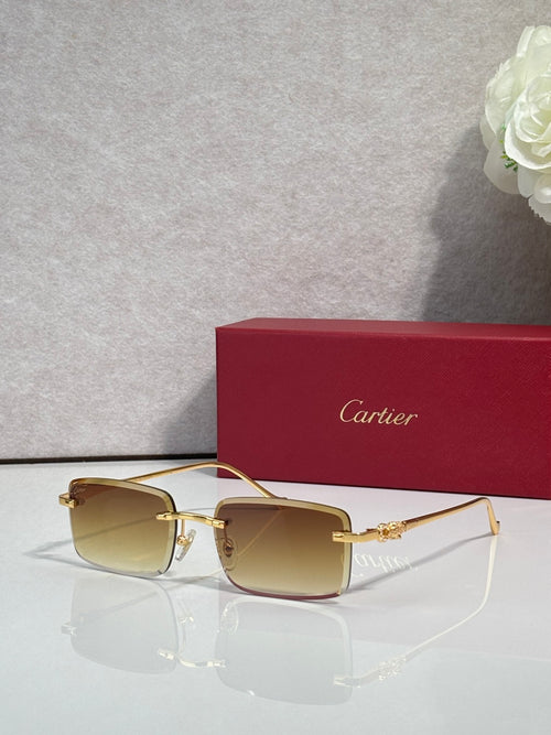 Cartier glasses with gold frame and amber gradient lenses, square silhouette