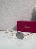 Cartier round eyeglasses with gold-tone metal frame and clear lenses
