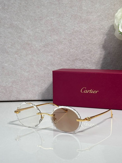 Cartier round eyeglasses with gold-tone frame and light tint lenses