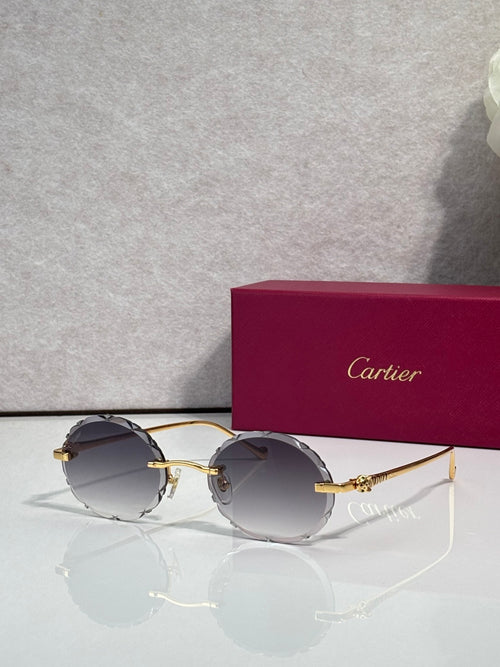 Cartier round sunglasses with gold frame and dark gray tinted lenses