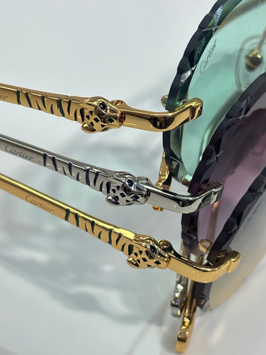 Cartier sunglasses hinge and patterned temple detail in gold