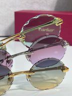 Cartier sunglasses stack: gold frame with purple, mint, and amber lenses