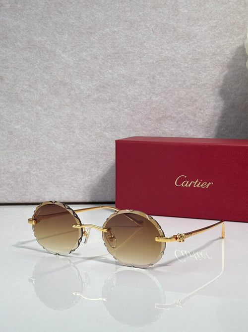 Cartier round sunglasses with gold frame and amber tinted lenses