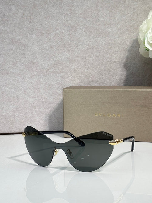 Bvlgari cat-eye sunglasses with dark lenses and gold-tone accents on temples