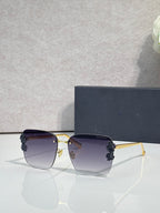 Dior sunglasses, gold frame, dark temples, lavender gradient lenses, dark floral accents