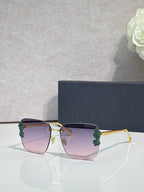 Dior sunglasses, gold frame, dark temples, purple gradient lenses, green floral accents