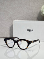 Celine round eyeglasses with dark acetate frames, angled front view, logo temples