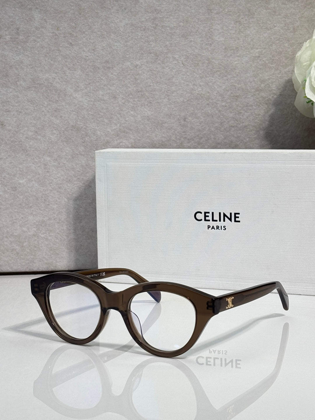 Celine round eyeglasses with tortoise acetate frames and gold-tone logo on temple