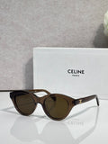 Celine sunglasses with black oval frames and dark-tinted lenses