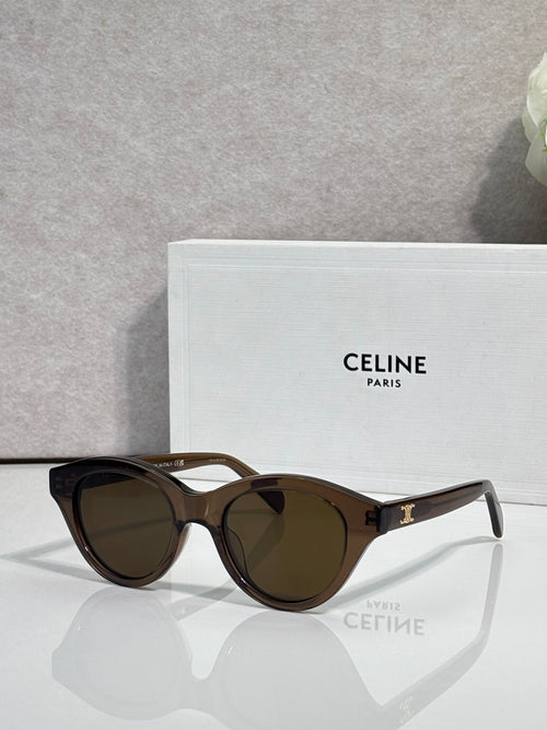 Celine sunglasses with black oval frames and dark-tinted lenses