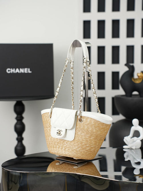 Chanel raffia tote bag with white flap pocket and chain shoulder strap
