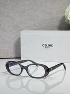 Celine glasses with dark frame and tinted lenses, gold logo temple