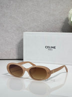 Celine sunglasses with light tan frame and brown-tinted oval lenses