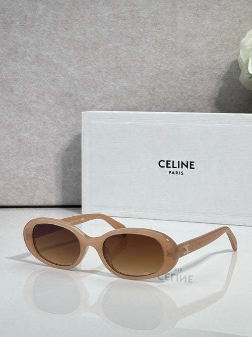 Celine sunglasses with light tan frame and brown-tinted oval lenses