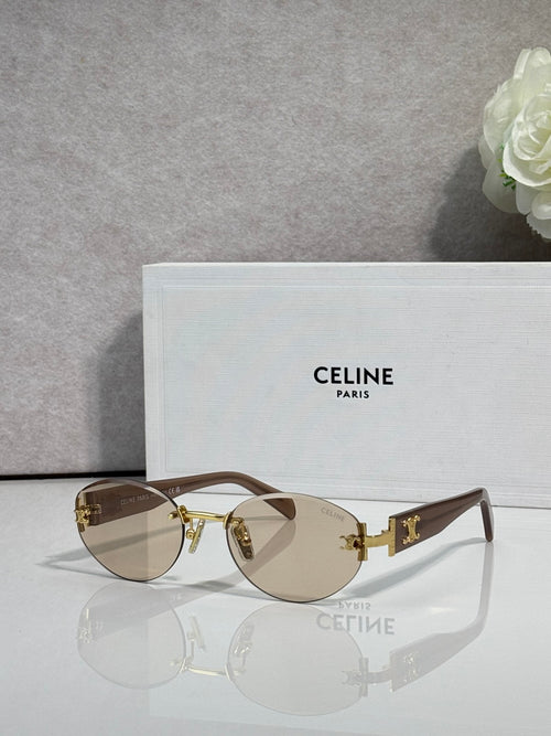 Celine round sunglasses with gold frame, brown-tinted lenses, and black arms