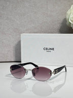 Celine round sunglasses with pink-tinted lenses, black frame arms, and gold details