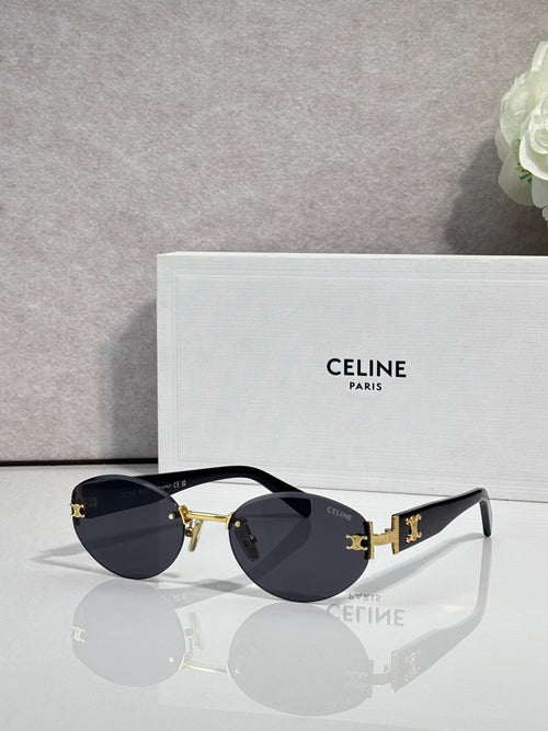 Celine round sunglasses with gold hardware, dark lenses, and black arms
