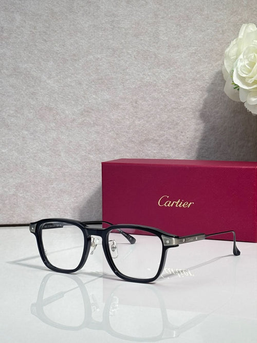 Cartier eyeglasses with black rectangular frames and clear lenses